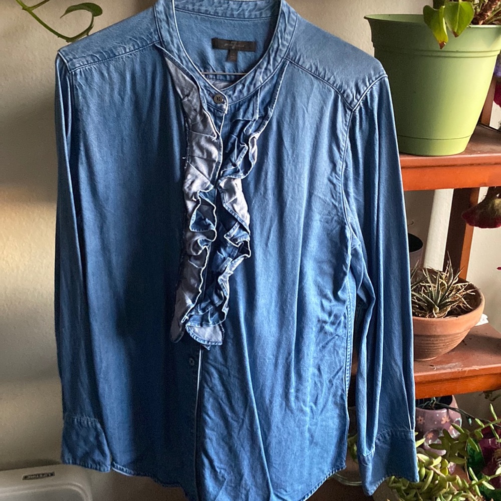 Brand new. Squished in the back of my closet denim ruffle shirt.
